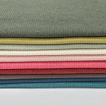 JM-Hacci Solid Color Repeated Pattern Poly Fabric.fall fabric weater, cardigan fabric. pink fabric.