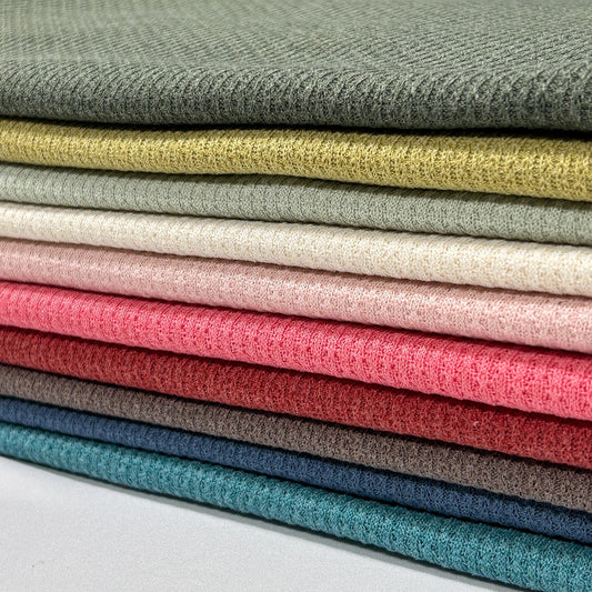 JM-Hacci Solid Color Repeated Pattern Poly Fabric.fall fabric weater, cardigan fabric. pink fabric.