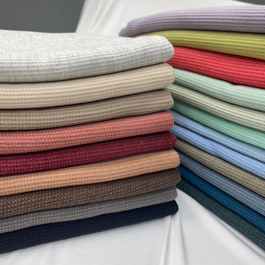 Knitted Waffle Fabric. Thermo-pd fabric. Soft Comfortable Brushed Stripe Elastane Viscose Polyester. Great for towels, bedding, baby fabric