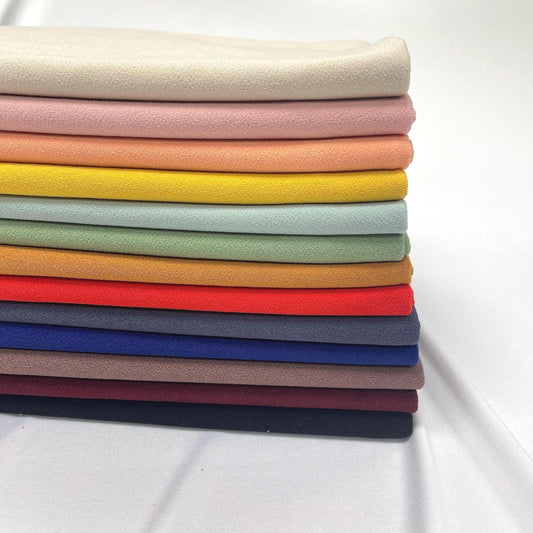 K-crepe/Knit Solid Color Textured Poly. 60" width. Fabric By The Yard.